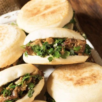  Rou Jia Mo: Uma Explosão de Sabor Carnivoro Envolto em um Pão Macio e Acolhedor?